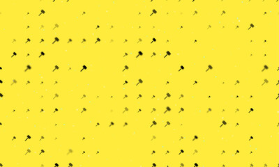 Seamless background pattern of evenly spaced black sledgehammer symbols of different sizes and opacity. Vector illustration on yellow background with stars