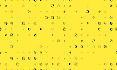 Seamless background pattern of evenly spaced black football symbols of different sizes and opacity. Vector illustration on yellow background with stars