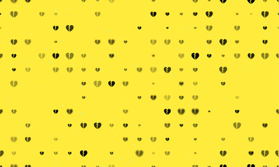 Seamless background pattern of evenly spaced black broken heart symbols of different sizes and opacity. Vector illustration on yellow background with stars