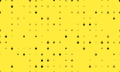Seamless background pattern of evenly spaced black fire symbols of different sizes and opacity. Vector illustration on yellow background with stars