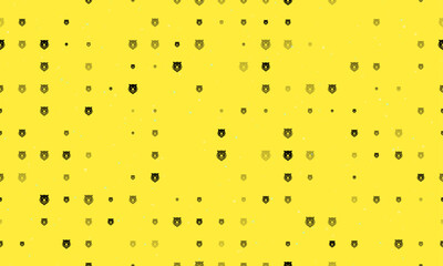 Seamless background pattern of evenly spaced black bear head icons of different sizes and opacity. Vector illustration on yellow background with stars