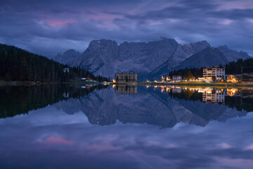 Panoramic view of Lago di Misurina in the evening after sunset. Blue hour in the Dolomites, Italy.