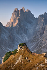 Amazing view of the Dolomites at sunrise. Cadini di Misurina viewpoint in the Italian Alps. Vertical view.                     