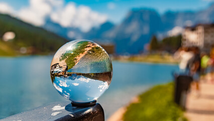 Crystal ball alpine landscape shot at Lago di Misurina, Lake Misurina, Belluno, Veneto, Italy