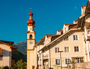 Fototapeta na wymiar Church on a sunny summer day at St. Johann, San Giovanni, Ahrntal valley, South Tyrol, Italy