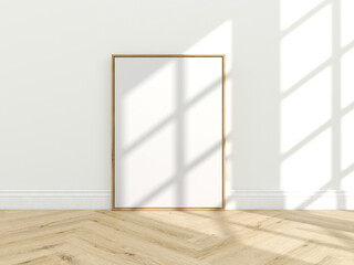 Vertical wooden frame mockup on wooden floor and white wall. Empty poster mockup close up with light and shadow. 3D illustration
