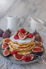 Pancakes with raspberries, figs, yogurt,
