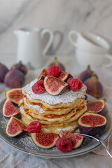 Pancakes with raspberries, figs, yogurt,