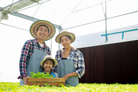 Thai Asian farmer family smiling and happiness