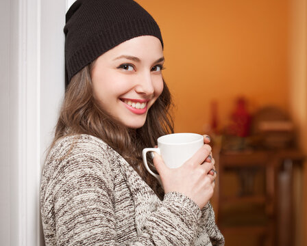 Smiling happy attractive brunette woman.