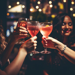 Lady's night out, group of female friends partying and celebrating 40 birthday in bar with margaritas