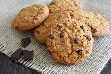 oatmeal biscuits with chocolate isolated on the table close up 