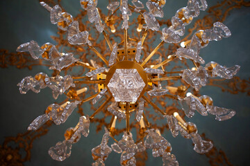 Low angle view of the tassels of a classic chandelier - Powered by Adobe