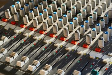 Mixing console for controlling the volume, frequencies of musical instruments