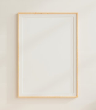 Empty poster mockup with vertical wooden frame