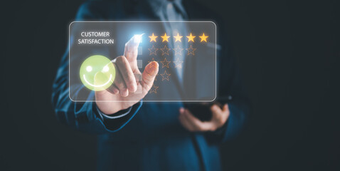 Close-up user give the excellent customer rating with five gold stars via mobile online application using finger touch check point box. Customer satisfaction concept, best score to feedback & service.