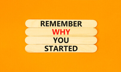 Remember why you started symbol. Concept word Remember why you started on beautiful wooden stick....