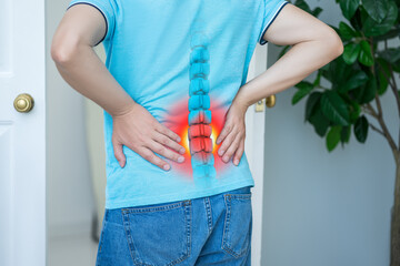 Lumbar intervertebral spine hernia, man with back pain at home, spinal disc disease - obrazy, fototapety, plakaty