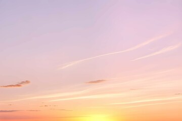 Obraz premium 淡いピンクとオレンジの夕焼け空に白いふわふわの雲と沈む太陽、夕暮れ時の空の色彩と雲の形の変化