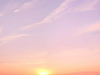 淡いピンクとオレンジの夕焼け空に白いふわふわの雲と沈む太陽、夕暮れ時の空の色彩と雲の形の変化