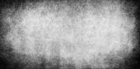 Fototapeta premium Abstract design with grunge black and white background . Old cement wall . scary dark texture of old paper parchment and .decorative plaster or concrete with vignette paper texture design .Dark wall 