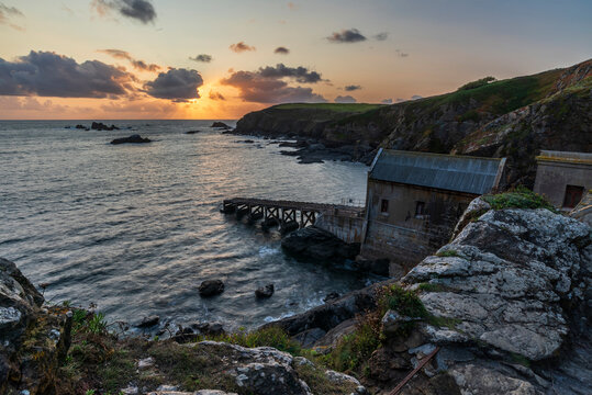 Lovely Summer sunset landscape image of Lizard Point in Cornwall UK during colourful dusk
