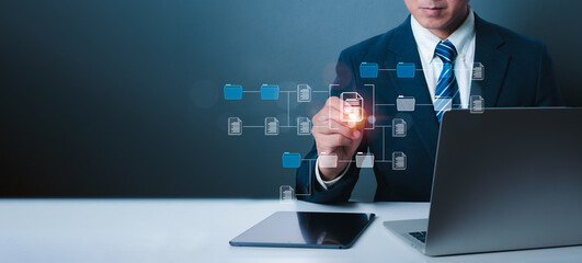 Agile software development is a technique and concept for managing lean projects that allows for rapid changes. Business developer use a Kanban board framework and a laptop.