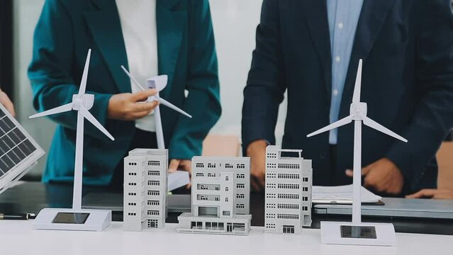 Business team people meeting and talking with engineer and architecture about planning and drawing of building construction project, smart executive professional working at outdoor, teamwork concept