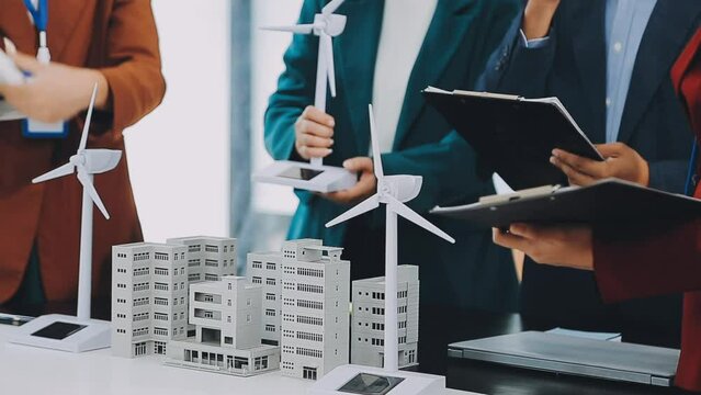 Business team people meeting and talking with engineer and architecture about planning and drawing of building construction project, smart executive professional working at outdoor, teamwork concept