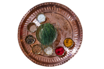 Traditional puja thali - plate for ritual ceremony with kumkum, haldi or turmeric powder, flowers...