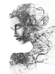 An abstract black and white double exposure female portrait