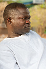 african businessman man in the park having a rest in the lunch break after long hours of work