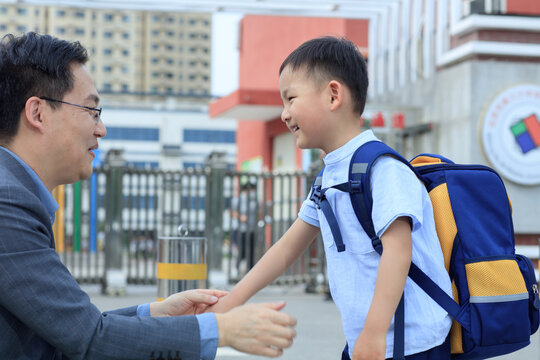 Father and son at the school gate