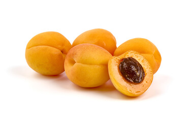 Isolated apricots. Fresh whole apricot fruit with half, isolated on white background.