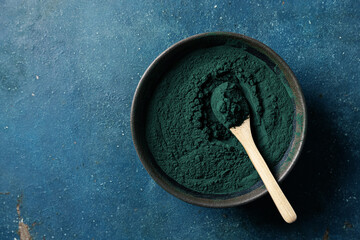 Green Algae Plant Powder Spirulina. Healthy dietary supplement.