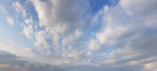 Floating white cloud on blue sky background. Panoramic sky nature horizon weather skyline