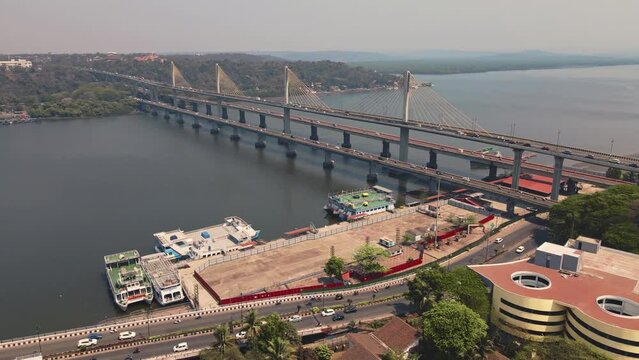 Aerial view of the skyline of the Fontainhas district of the city of Panaji, Goa with the Atal Setu bridge in the background. Famous tourist destination, Goa, India. Developing India concept.