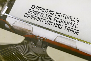 The text is printed on a typewriter - expanding mutually beneficial economic cooperation and trade