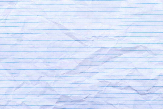 Top view empty rumpled lined paper with wrinkled. Notebook lined paper background and texture.