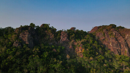 Drone photo of rocky mountain side of Nglanggeran prehistoric volcano, Yogyakarta, Indonesia - 4K drone shot