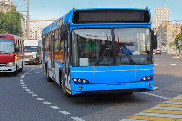 Buses move along the avenue - 669584832