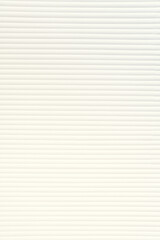 Obraz premium The texture of concrete with a subtle ripple effect gives the surface a unique and dynamic look. Vertical image with space to copy. High quality photo