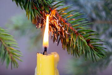 A branch of a Christmas tree caught fire from a candle, a fire due to non-compliance with safety...
