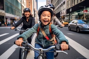 Happy and cheerful asian family enjoying outdoor bikes activity on the streets of the city .