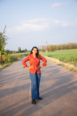 women asian standing on the countryside road