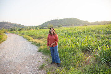 women asian standing on the countryside road