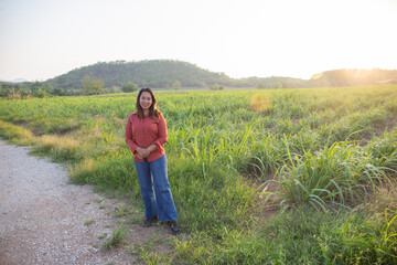 women asian standing on the countryside road