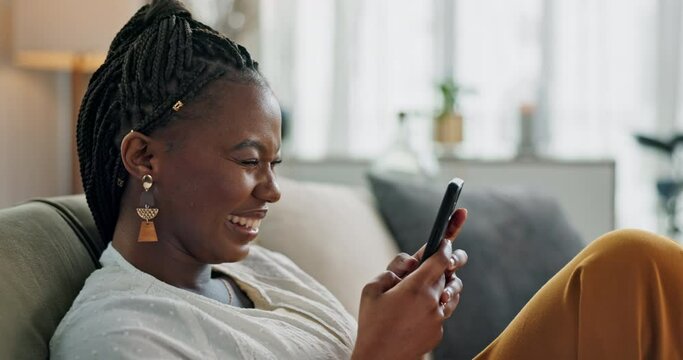 Home, funny and black woman on a couch, smartphone and connection with social media, comedy post and laugh. African person, apartment or girl on sofa, cellphone or mobile user with humor, joy or joke