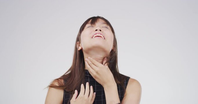 Woman, pain and sick with disease, virus and hand on neck, relief and sore. Allergy, flu infection and choking for strain, medical problem and health issue for bacteria, studio background and swollen