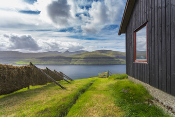 Stunning seascapes near the village of Gjogv on the northeast tip of Eysturoy island, in the Faroe...